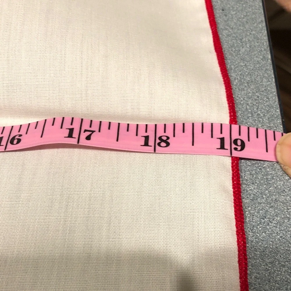 Embroidered Table Linens with Red Trim